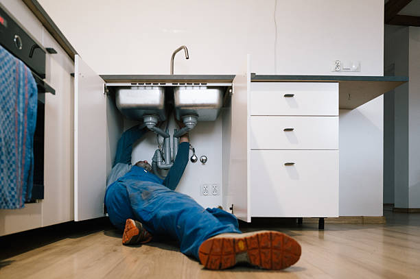 Professional Drain Cleaning technician working in Highland, AR